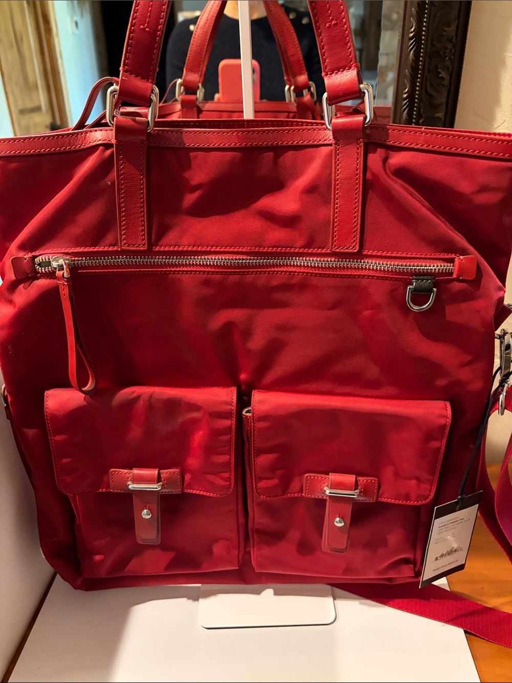 Tumi Red Nylon Tote with Front Zip and Dual Flap Pockets